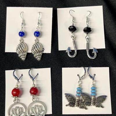 EHE184 - Myrna Lee Chang Pewter Silver Lotus, Shell, Butterfly, & Makau Hook Earrings