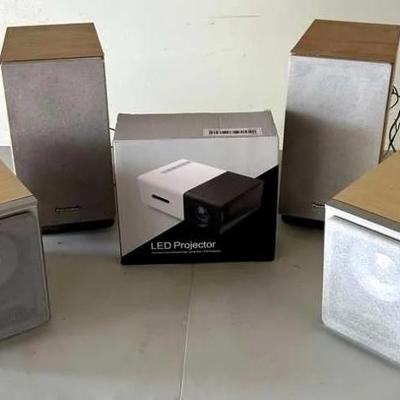 EHE424- Home Audio & Projector Lot