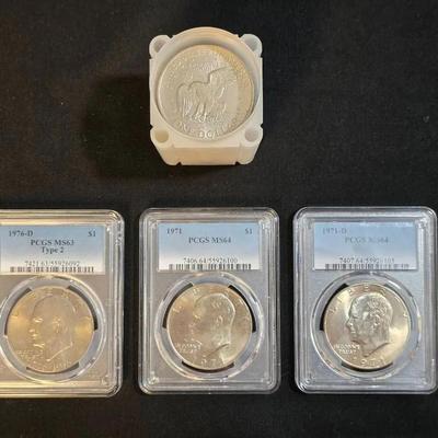 3 PCGS Graded Eisenhower Dollars and 1 Roll of 20 Eisenhower Dollars 