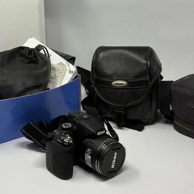 Nikon Coolpix P520 Digital Camera, Bag, and  Assorted Wires