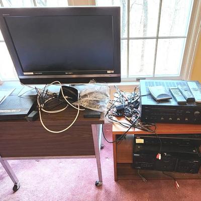 Sony BRAVIA TV, Sound System Recievers And Accesories W/ Two Desk Tables -