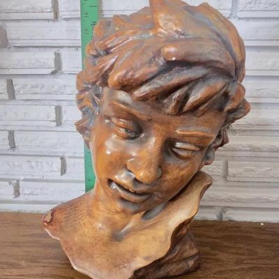 Jean-Baptiste Carpeaux's "Le Rieur Napolitain" (The Laughing Neapolitan) sculpture. 