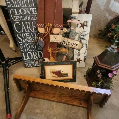 Home Decor With Inspirational Quotes, Wall Hangings And Oak Wooden Shelf