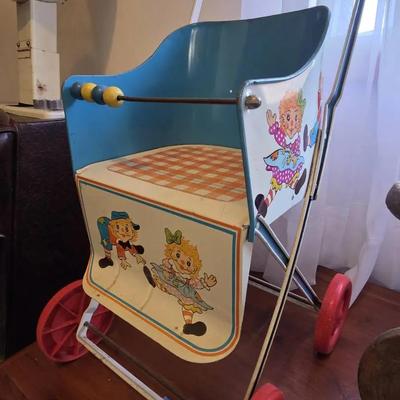 Vintage Ohio Art Metal Doll Stroller Featuring Raggedy Ann and Andy Graphics. 