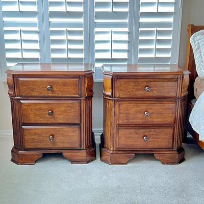 Pair of Warm Wood Three-Drawer Nightstands by Ashley Furniture