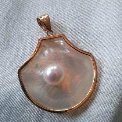 14 k gold shell pendant w real pearl