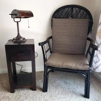 Black Rattan Armchair, Wood Side Table, and Banker Lamp