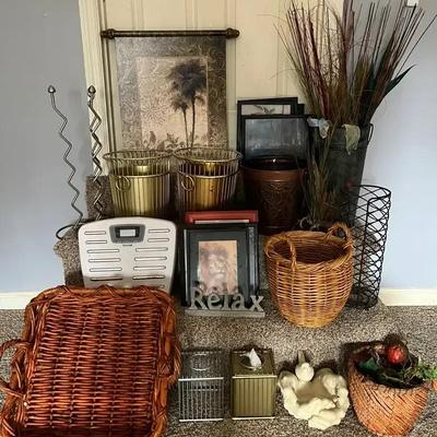 Variety of Bathroom Décor Including Trash Bins, Picture Frames, and Scale