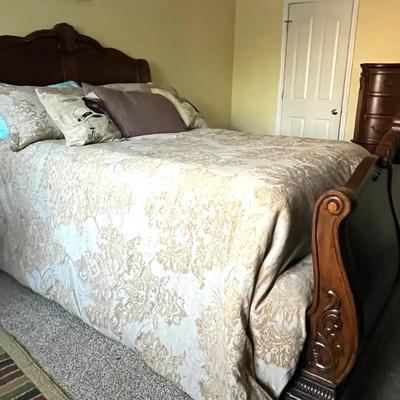 Ornately Carved Wooden Bed Frame with Mattress, Box Spring, and Bedding