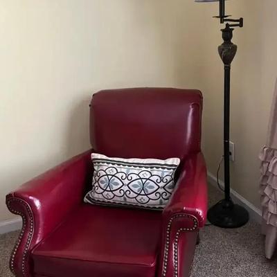 Red Armchair with Nailhead Trim and Floor Lamp