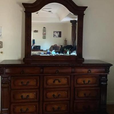 Wooden Dresser with Beveled Mirror and Metal Pulls