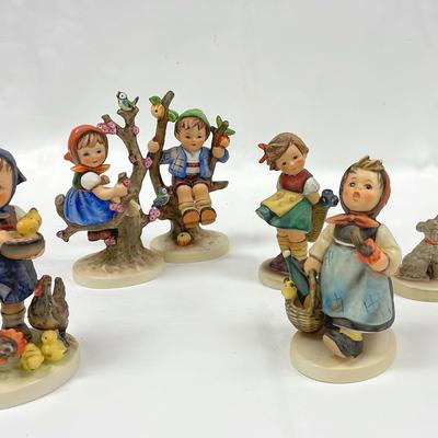 Iconic hummelgoebel figurines in a variety of poses