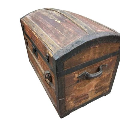 Antique dome-top or barrel-top steamer trunk