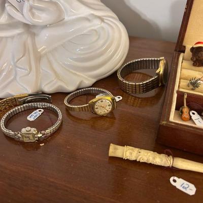 Sale Photo Thumbnail #240: Vintage watches. Far left watch is by Tissot. 14k gold case with diamond accents. 