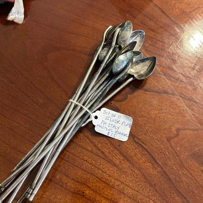 Sale Photo Thumbnail #150: Set of 11 silver plate PM Italy c-ocktail stirrers. 