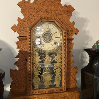 Sale Photo Thumbnail #424: William Gilbert solid oak Geranium clock. 