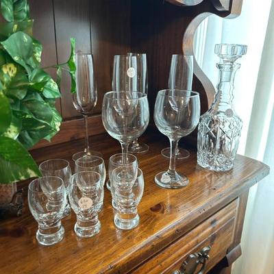 Sale Photo Thumbnail #500: Various vintage crystal stemware, decanter, and shot glasses. 