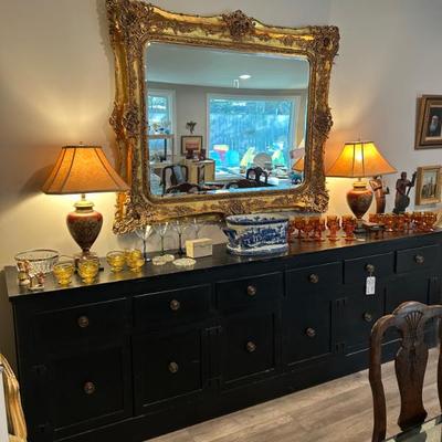 Massive solid wood buffet with brass hardware. 