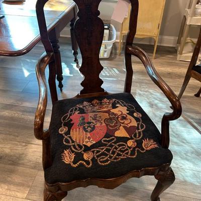 Set of 8 solid wood Queen Anne style dining chairs. Love the fabric! 