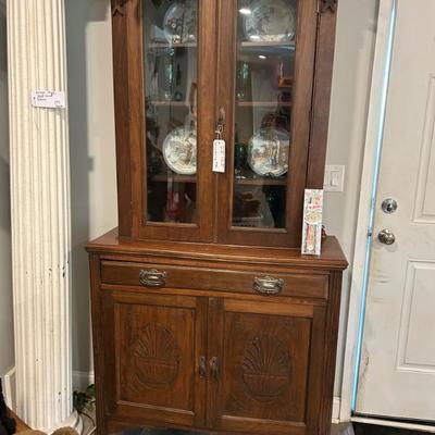 Antique solid wood china cabinet. 