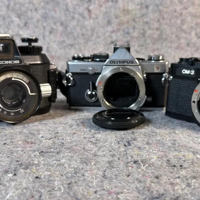 Olympus OM-2 & OM-3 SLR Camera Bodies with Nikonos IV-A & Nikkor 35mm Lens