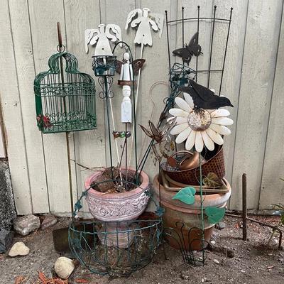 Garden Pots And Decor Featuring Angels, Bird Cage, And Butterfly Trellis 