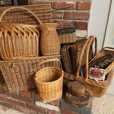Variety Of Baskets with Woven Trays and Picnic Basket