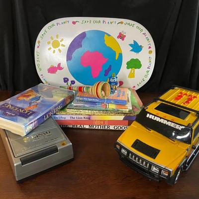 Kids Lot Featuring VHS Player with Lion King VHS, Motorized Hummer, and Vintage Placemat