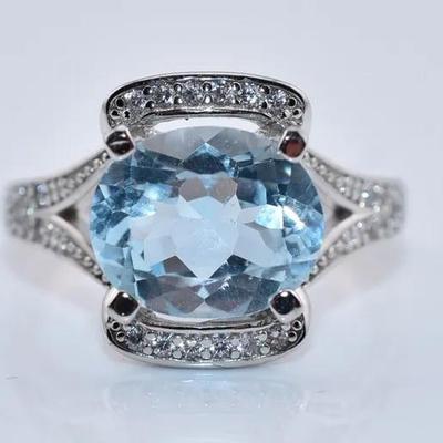 4.4 Carat Natural Oval Sky Blue Topaz Ring