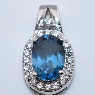 Natural Oval London Blue Topaz Sterling Silver Pendant