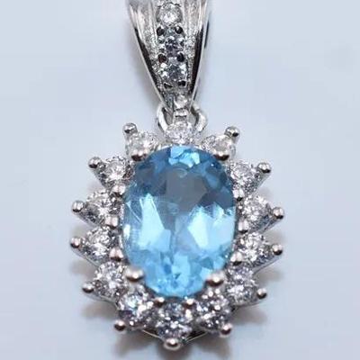 Natural Oval Blue Topaz Sterling Silver Pendant