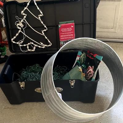 Metal Christmas Tree Skirt, Holiday Lights, and Plastic Storage Bin