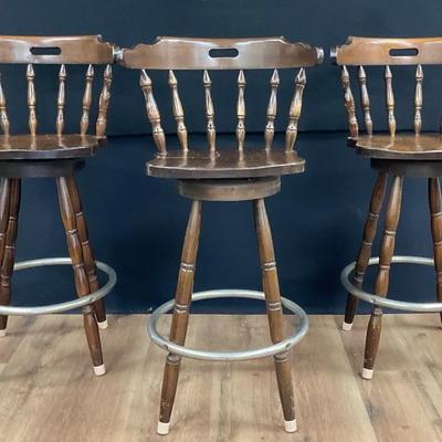 Three Solid Wood Bar Height Swivel Barstools