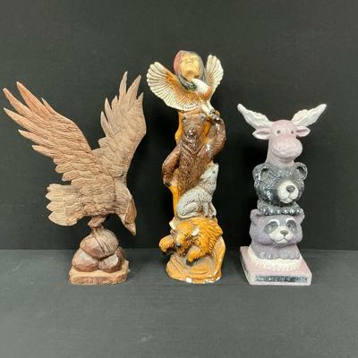 Totem Poles And Eagle Sculpture 