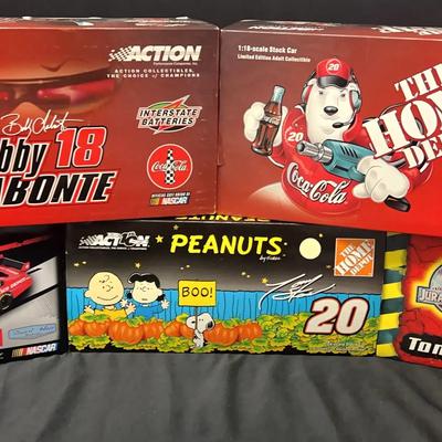 NASCAR 1:18 & 1:24 Scale Stock Cars, featuring Peanuts, Jurassic Park, Coca-Cola & Home Depot