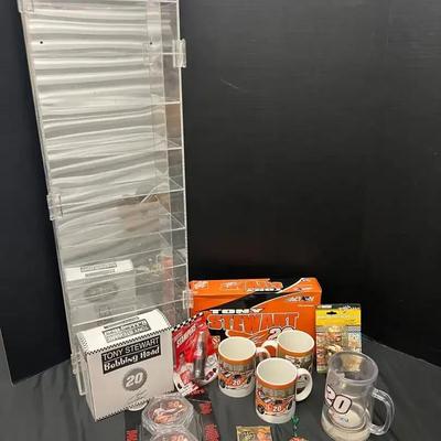 Tony Stewart Collectibles Featuring Display Case, Mugs, Bobblehead & 1:64 Hauler