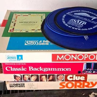 Variety of Golf Balls and Board Games