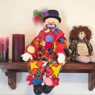 Pillar Candles, Clown Doll, and a Rag Doll