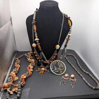 An Assortment Of Necklaces Including Chico's