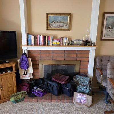 Sale Photo Thumbnail #29: Books, travel bags, computer bags, suitcases, and more