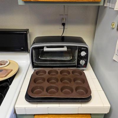 Sale Photo Thumbnail #41: Oster toaster oven, muffin tins