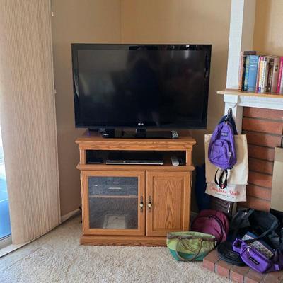Sale Photo Thumbnail #9: LG LED HD TV, Sauder oak TV stand, JVC VHS tape player, Toshiba DVD player