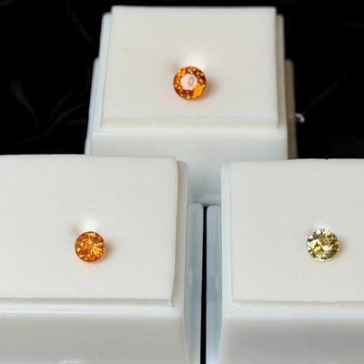 DM135 – Yellow Zircon & Garnet Trio (.60 CT Zircon, .75 CT Mandarin Garnet, 1.30 CT Spessartite)