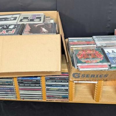 Large CD Music Collection with Wooden Storage Rack and Boxed CDs