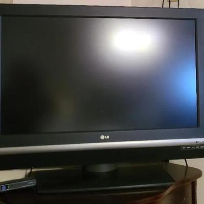 Hours Of Entertainment  - LG 36" TV With Remote/Tabletop Platform Base