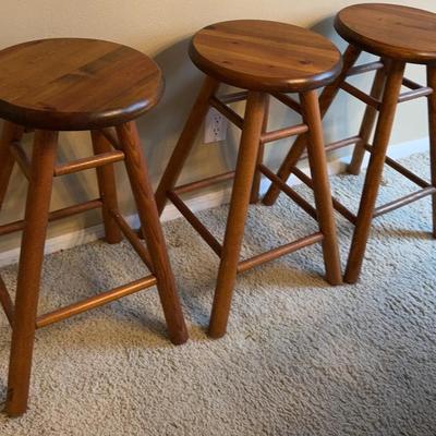 Three Wooden Swivel Bar Stools