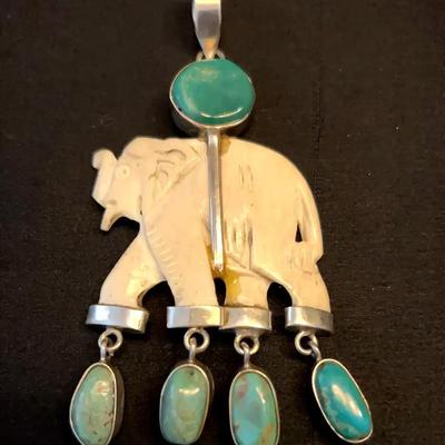 Antique DZT sterling silver and turquoise elephant pendant
