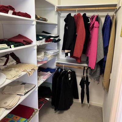Sale Photo Thumbnail #222: Coats and table linens 