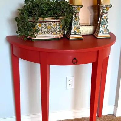 Demi lune wood table complementing decor