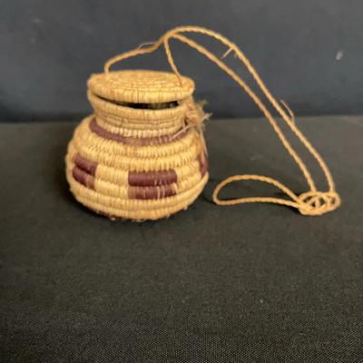 Small Lidded Basket with Feathers Contained Inside